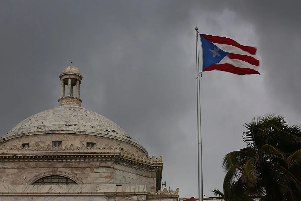 The Puerto Rican flag flies near the Capitol building in San Juan, Puerto Rico on July 1, 2015. (Joe Raedle/Getty Images)