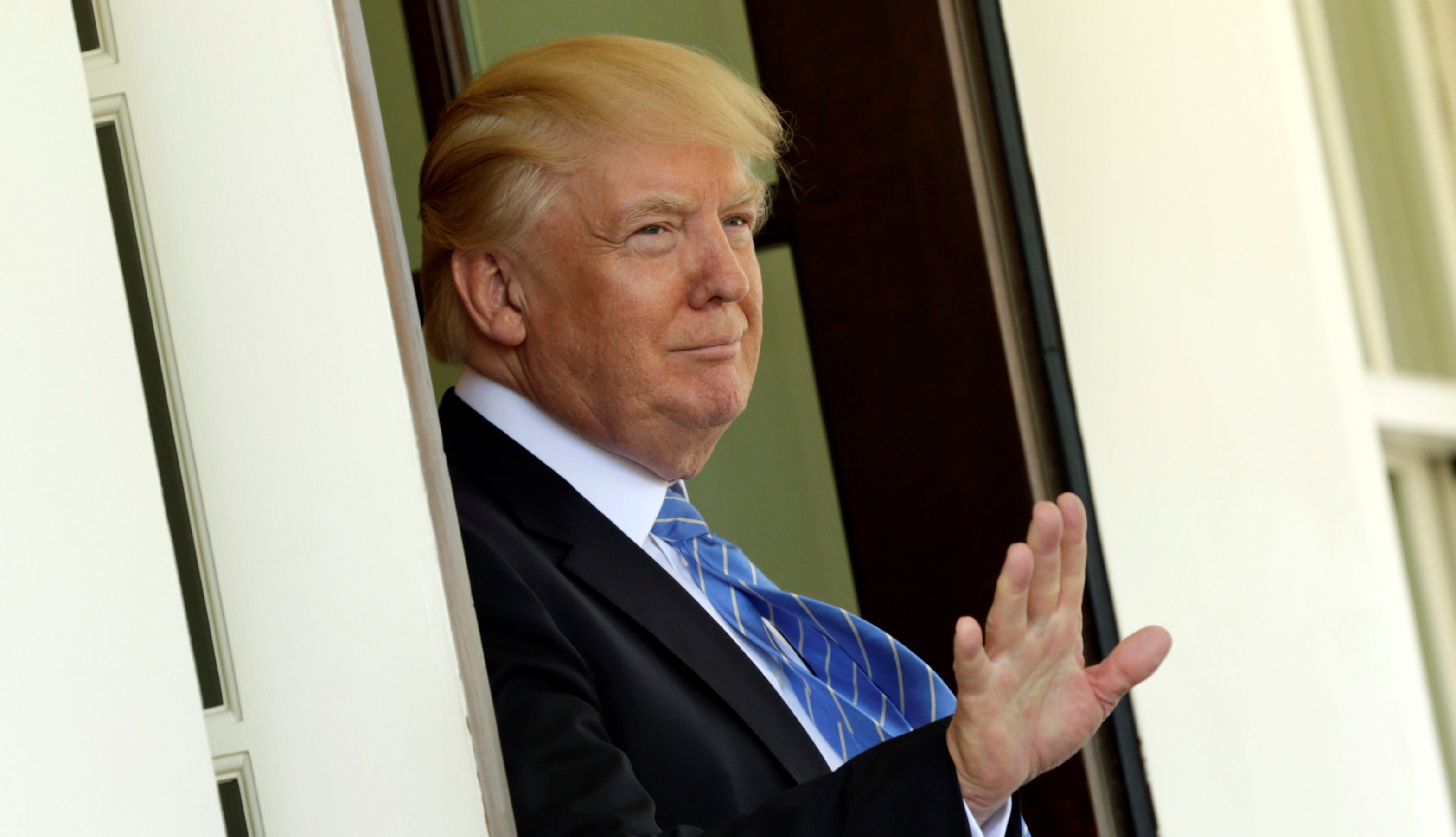 President Donald Trump gestures to the media after Palestinian President Mahmoud Abbas left the White House in Washington on May 3, 2017. (REUTERS/Yuri Gripas)
