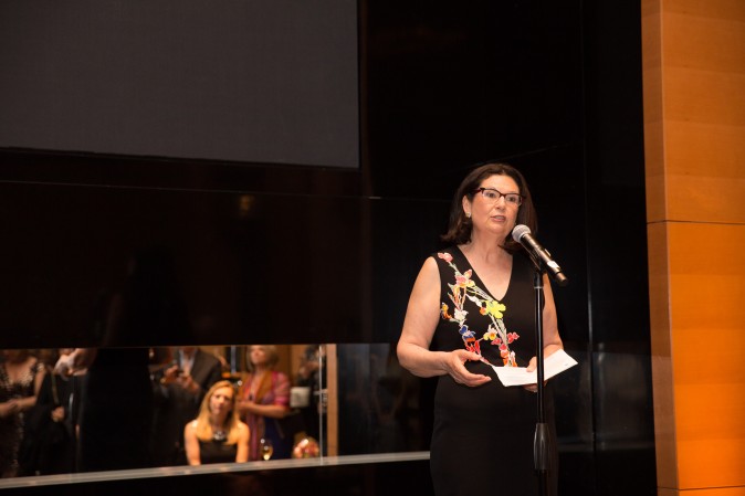 Ellie Johnson, president of the Berkshire Hathaway HomeServices New York Properties, speaks to guests during the celebration of their grand opening location in New York. (Benjamin Chasteen/The Epoch Times)
