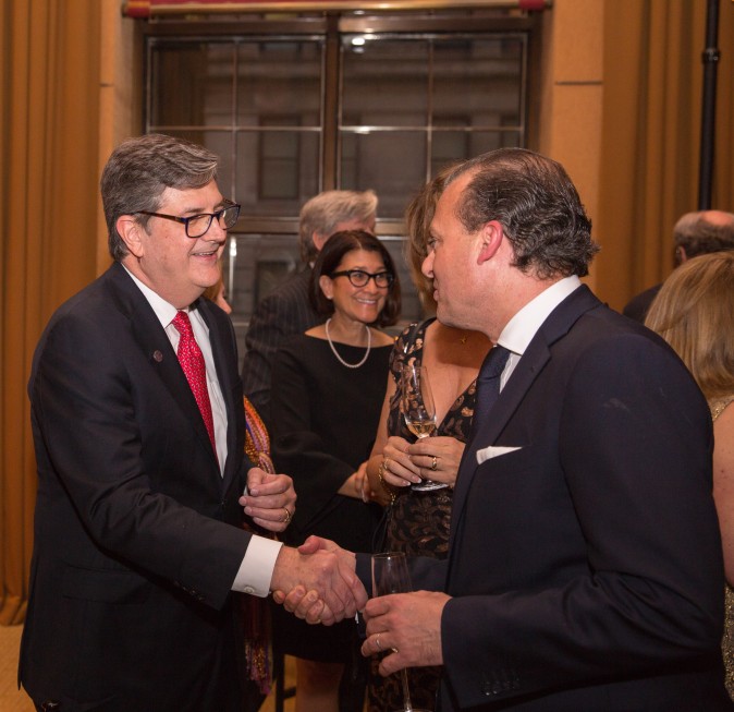 Peter Turtzo, Senior Vice President at Berkshire Hathaway HomeServices greets guests at the Berkshire Hathaway HomeServices New York  celebration. (Benjamin Chasteen/The Epoch Times)