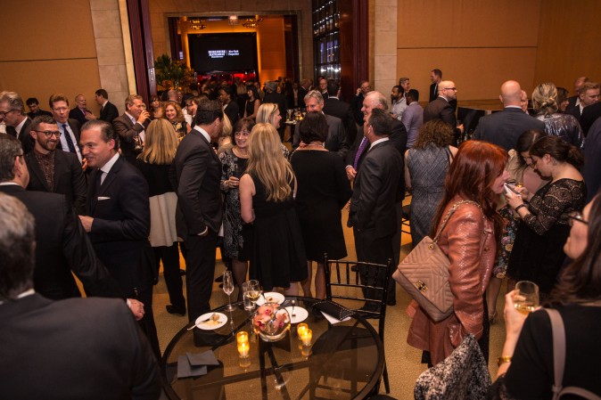 Guests and real estate agents celebrate the opening of Berkshire Hathaway HomeServices New York Properties hosted at the Four Seasons Hotel New York on April 26, 2017. (Benjamin Chasteen/The Epoch Times)