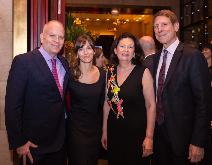 Guests and real estate agents celebrate the opening of Berkshire Hathaway HomeServices New York Properties hosted at the Four Seasons hotel in Manhattan on April 26, 2017. (Benjamin Chasteen/The Epoch Times)