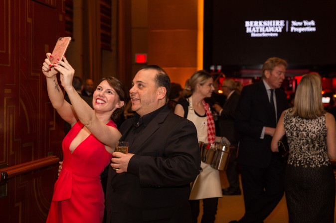 Guests and real estate agents celebrate the opening of Berkshire Hathaway HomeServices New York Properties hosted at the Four Seasons Hotel New York on April 26, 2017. (Benjamin Chasteen/The Epoch Times)