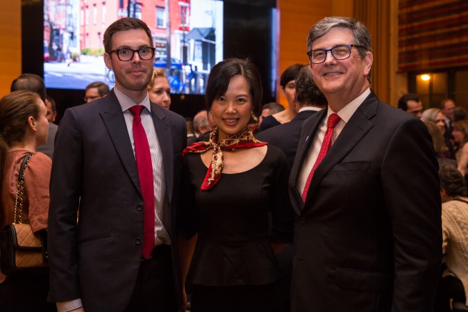Adam and Angie Ainsworth with Peter Turtzo, Senior Vice President at Berkshire Hathaway HomeServices at the Berkshire Hathaway HomeServices New York  celebration. (Benjamin Chasteen/The Epoch Times)