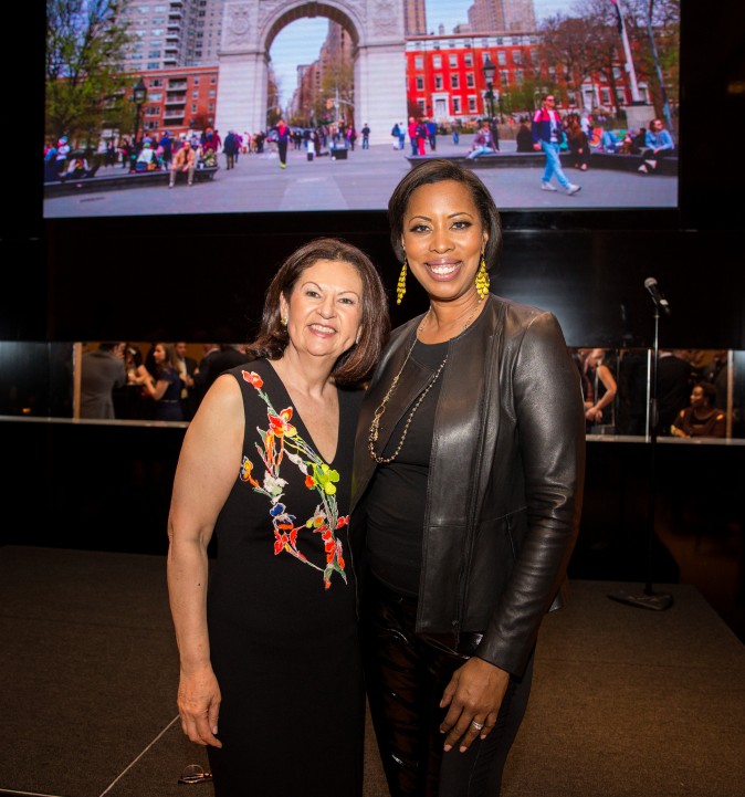 Ellie Johnson, president of the Berkshire Hathaway HomeServices New York Properties, with a guest at the Berkshire Hathaway HomeServices New York  celebration. (Benjamin Chasteen/The Epoch Times)