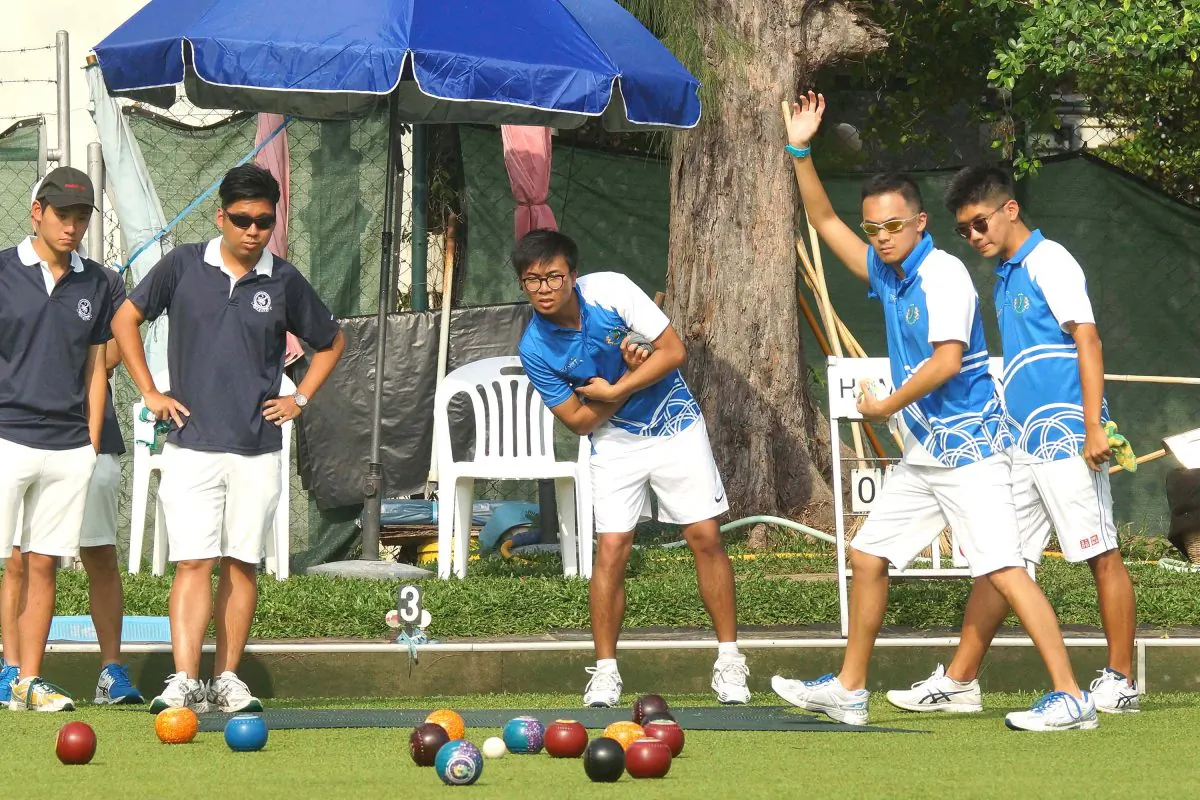 Adrian Yau (second from right) of the Youth Development Team waived to indicate a good bowl from skipper Jason Choi (not in photo) during the semi-final of the National Fours last Sunday, May 7. 2017. But the performance was not good enough to take them through to the final as they were defeated by Craigengower Cricket Club 17-14. (Mike Worth)