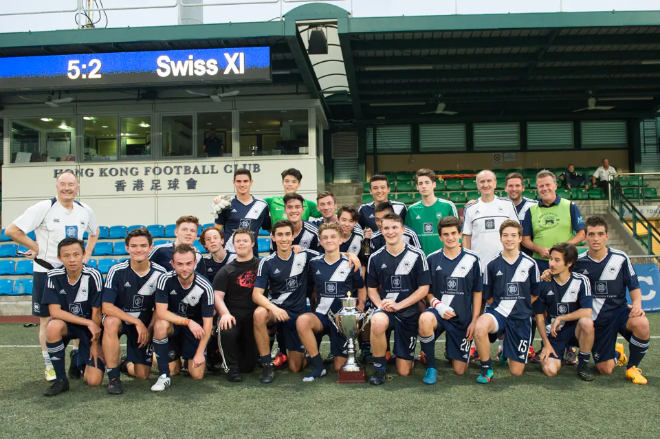 Colts celebrate winning the Yau Yee League Cup, securing the victory against Swiss Xi on penalties after the match had been level on 1-1 at the end of extra time. The match was played at Sports Road on Saturday May 6, 2017. (Bill Cox/Epoch Times))