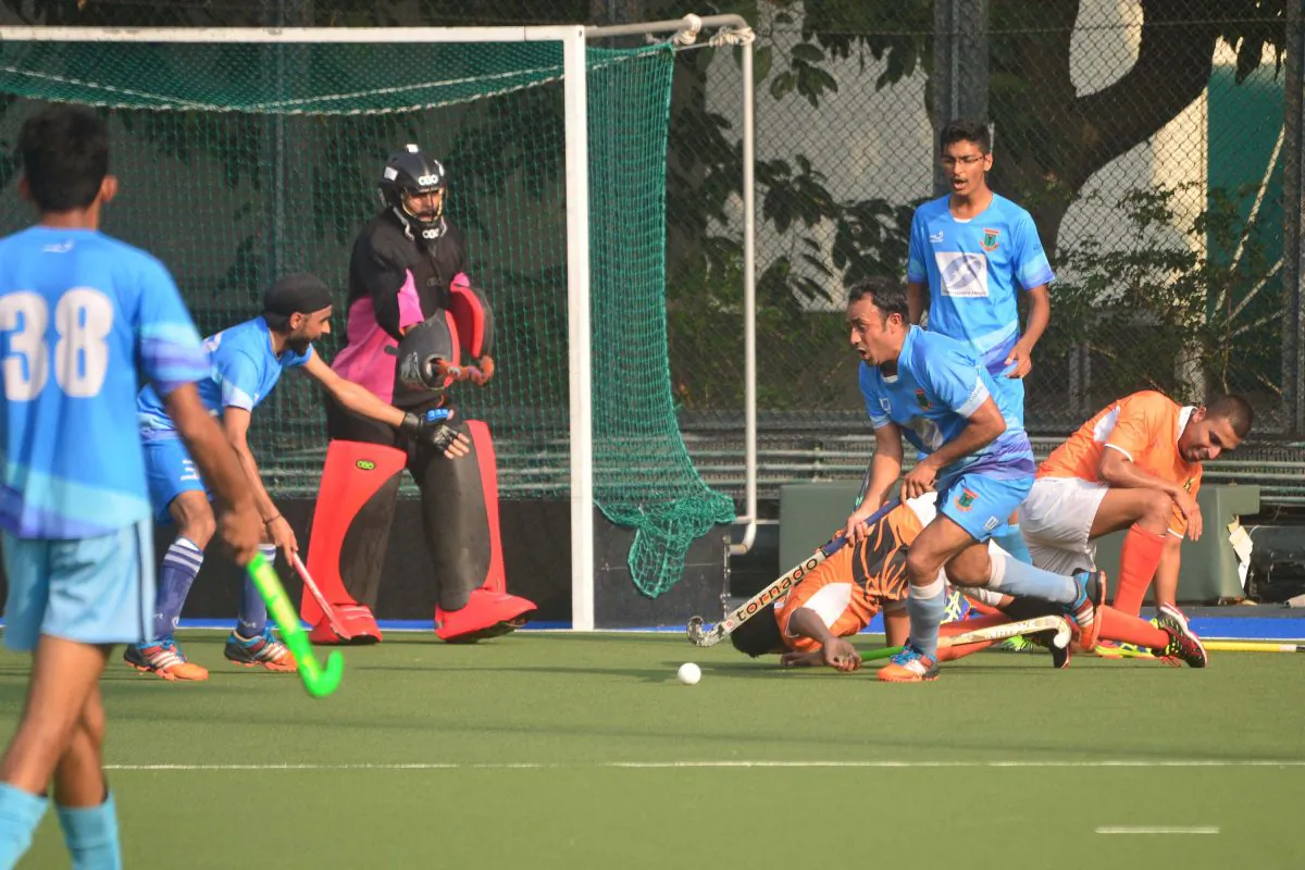 NBC Goalkeeper, Singh Dilyadav and Farooz Khan, player/coach clears what should have been another danger on the NBC-A goal. (Eddie So) 