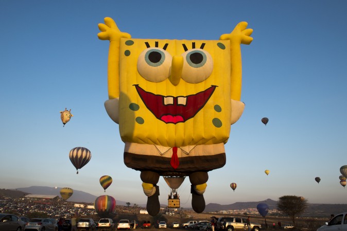 Hot-air balloons fly during the Balloon Festival in Cajititlan, Mexico, on May 07, 2017. (HECTOR GUERRERO/AFP/Getty Images)