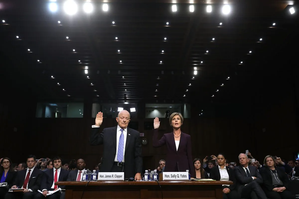 Former Director of National Intelligence James Clapper and former acting U.S. Attorney General Sally Yates are sworn in before testifying to the Senate Judiciary Committee's Subcommittee on Crime and Terrorism on May 8. (Chip Somodevilla/Getty Images)
