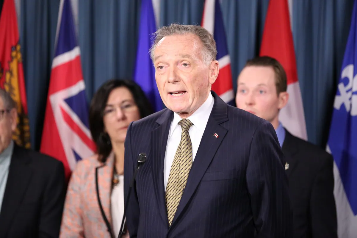 MP Peter Kent speaks at a press conference in support of efforts to secure the release of Canadian citizen Sun Qian detained in China for her practice of Falun Gong, on Parliament Hill in Ottawa on May 9, 2017. (Jonathan Ren/NTD Television)