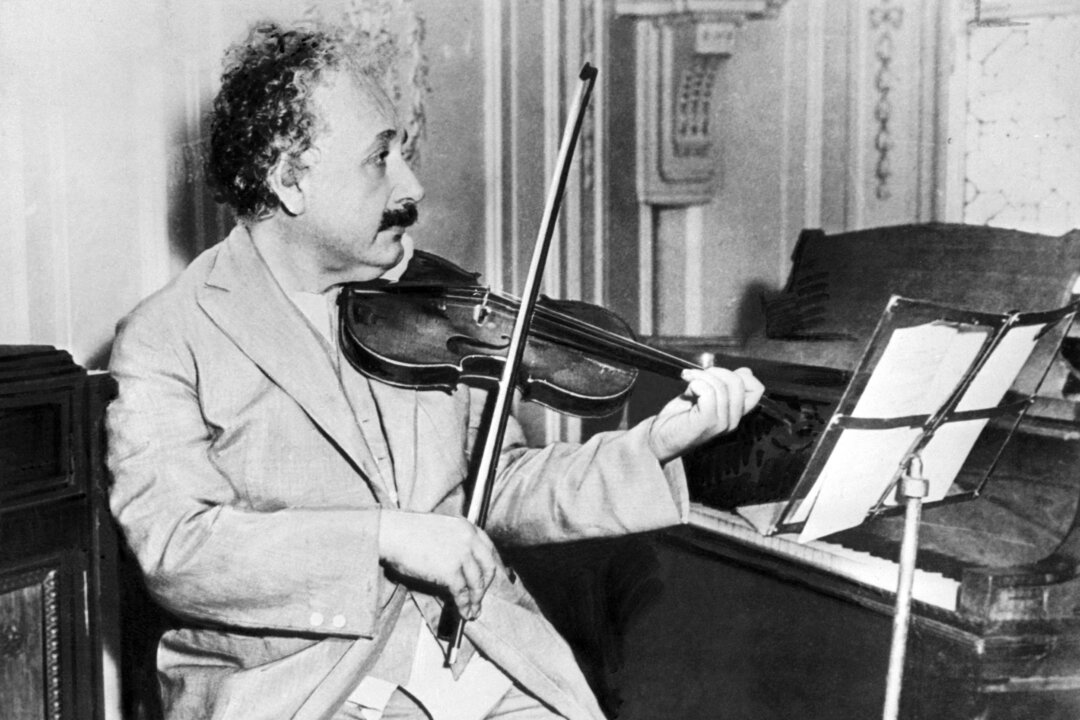 Physicist Albert Einstein playing the violin in 1931. (-/AFP/Getty Images)