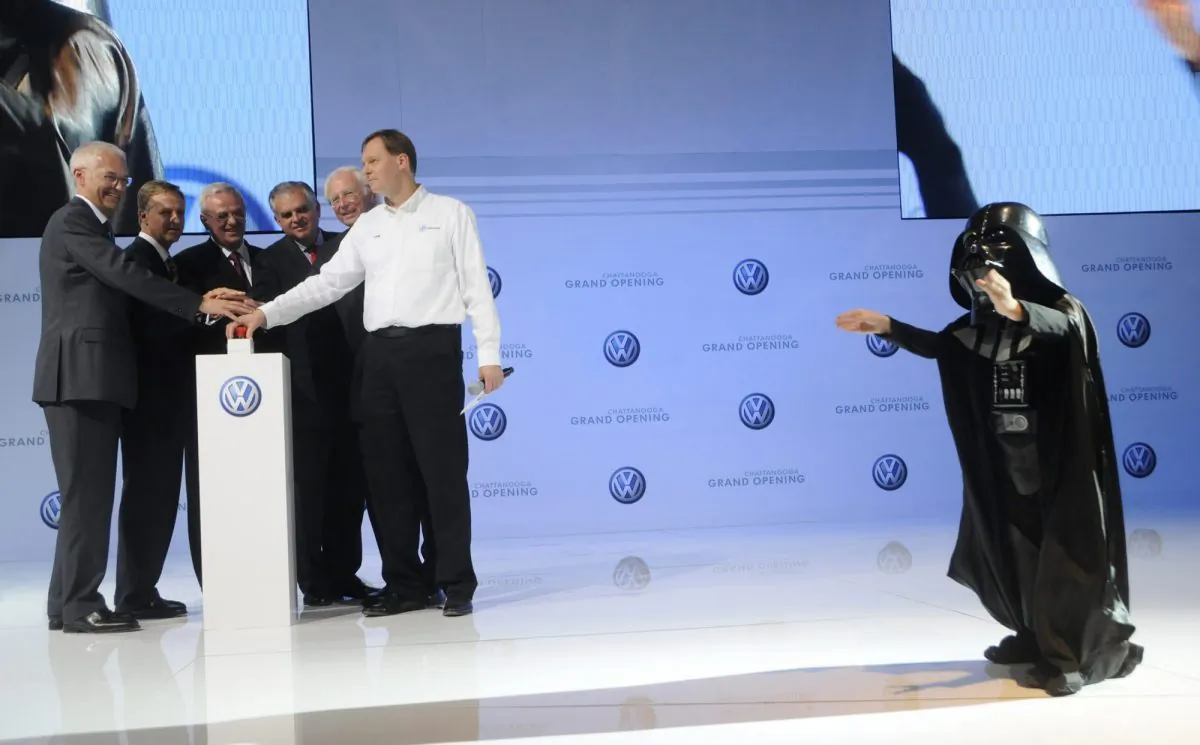 Child actor Max Page, dressed as Darth Vader, plays to the crowd as Volkswagen management push the red button on May 24, 2011, at the Volkswagen Grand Opening in Chattanooga, Tenn. Earlier in 2011, VW’s Darth Vader ad during the Super Bowl was a winner in neuromarketing. (AP Photo/Billy Weeks)