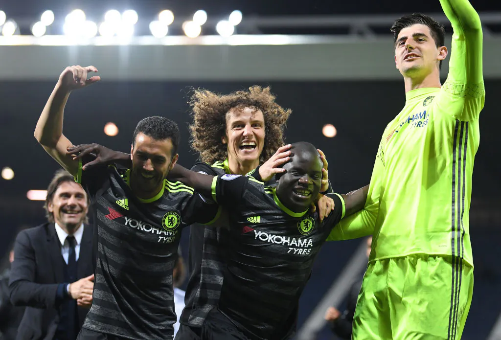 (L-R) Antonio Conte, Pedro, David Luiz, N'Golo Kante and Thibaut Courtois of Chelsea celebrate winning the league during the Premier League match between West Bromwich Albion and Chelsea at The Hawthorns on May 12, 2017 in West Bromwich, England. (Laurence Griffiths/Getty Images)