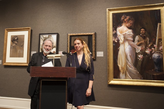 Frederick Ross, founder and chairman of Art Renewal Center (ARC), and his daughter, Kara Lusandra Ross, Director of Operations of ARC, give speeches at the press preview of the 12th International ARC Salon Exhibition at the Salmagundi Club in Manhatan, New York, on May 12, 2017. (Milene Fernandez/The Epoch Times)