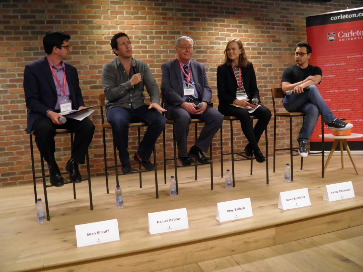 Daniel Debow (2nd L) speaks on a panel about Canadian tech featuring Tony Bailetti (C), Janet Bannister (2nd R), Harley Finkelstein (far R), and moderated by Globe & Mail reporter Sean Silcoff (far L) at Shopify's Elgin Street office in Ottawa, Canada on May 15, 2017. (Rahul Vaidyanath/Epoch Times)