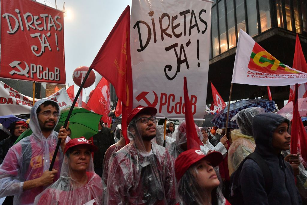 Demonstrators protest against Brazilian President Michel Temer along Paulista Avenue in Sao Paulo Brazil on May 21 2017. (NELSON ALMEIDA/AFP/Getty Images)