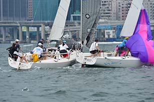 'Bumphead' fights it out with 'Sail La Vie' in the RHKYC Spring Regatta in Victoria Harbour on May 20, 2017. (Bill Cox/Epoch Times)