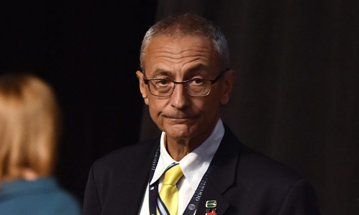 John Podesta, chairman of the 2016 Hillary Clinton presidential campaign, looks on before the first vice presidential debate at Longwood University in Farmville, Va., on Oct. 4, 2016. (Paul J. Richards/AFP/Getty Images)