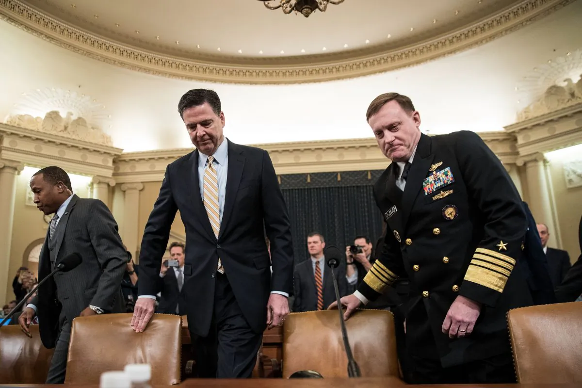 James Comey, Director of the Federal Bureau of Investigation (FBI), and Michael Rogers, Director of the National Security Agency, arrive for a House Permanent Select Committee on Intelligence hearing concerning Russian meddling in the 2016 United States election, on Capitol Hill, March 20, 2017. (Drew Angerer/Getty Images)