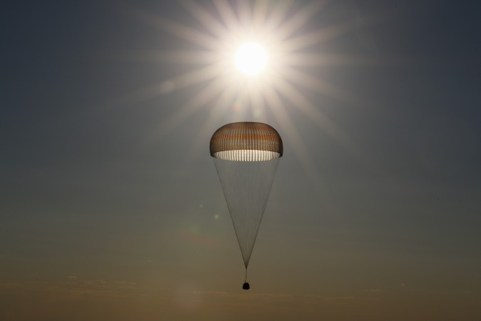 The Soyuz MS-03 space capsule carrying the International Space Station crew of Russian cosmonaut Oleg Novitskiy and French astronaut Thomas Pesquet descends beneath a parachute just before landing in a remote area outside the town of Dzhezkazgan, Kazakhstan, on June 2, 2017. (SHAMIL ZHUMATOV/AFP/Getty Images)