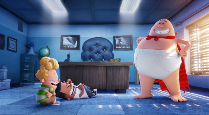 (L–R) Harold (voiced by Thomas Middleditch) and George (voiced by Kevin Hart) crack up at the sight Captain Underpants (voiced by Ed Helms) in DreamWorks Animation's