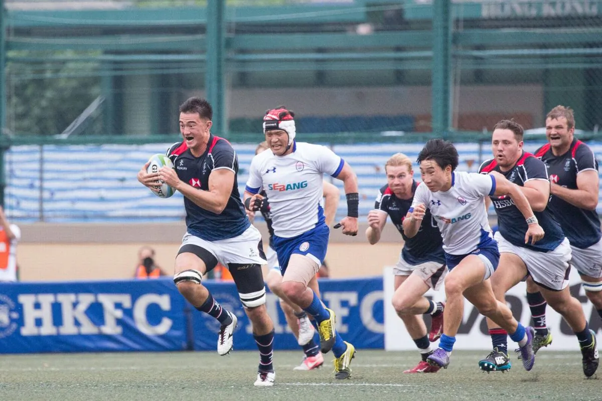 Hong Kong’s Kyle Sllivan outsprints the Korean defence during Hong Kong’s 39-3 win against South Korea  in the last of the 2017 Asia Rugby Championship matches at Hong Kong Football Club on Saturday June  3. (Dan Marchant)