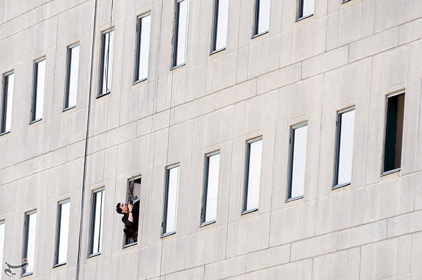 A member of Iranian forces aims his weapon during an attack on the Iranian parliament in central Tehran, Iran on June 7, 2017. (Tasnim News Agency/Handout via REUTERS)