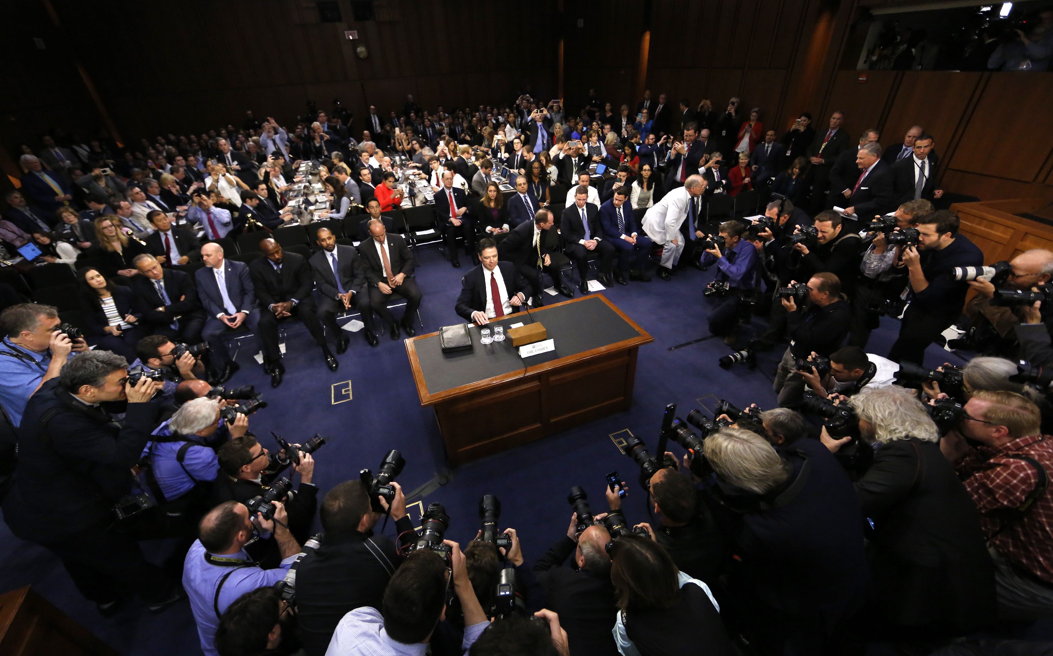 Former FBI Director James Comey prepares to testify before a Senate Intelligence Committee hearing on "Russian Federation Efforts to Interfere in the 2016 U.S. Elections" on Capitol Hill in Washington on June 8, 2017. (REUTERS/Jim Bourg)