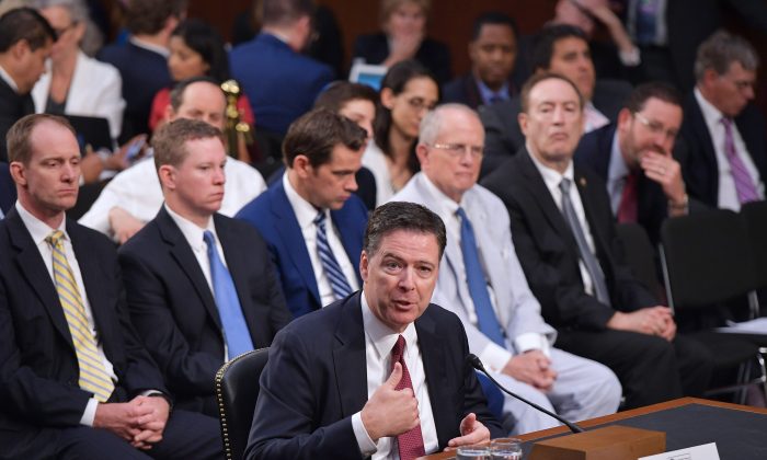 Former FBI director James Comey testifies before the Senate Select Committee on Intelligence in the Hart Senate Office Building on June 8. (MANDEL NGAN/AFP/Getty Images)
