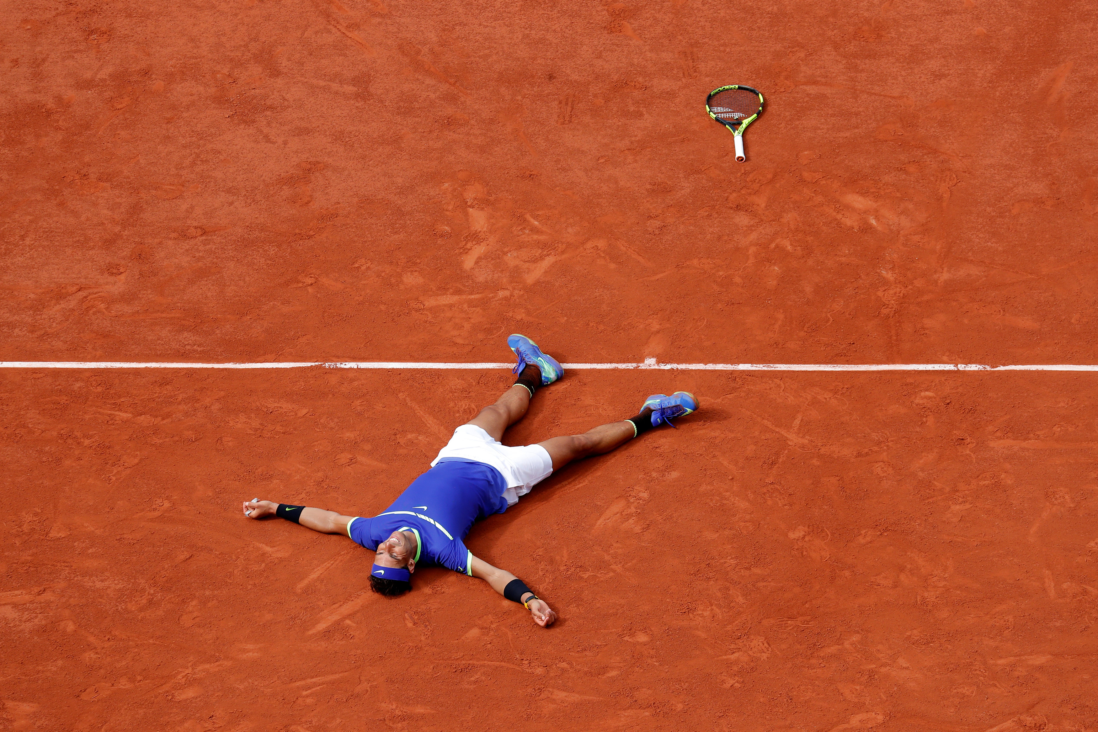 Tennis - French Open - Roland Garros, Paris, France - June 11, 2017 Spain's Rafael Nadal celebrates winning the final against Switzerland's Stan Wawrinka. (Reuters/Gonzalo Fuentes)
