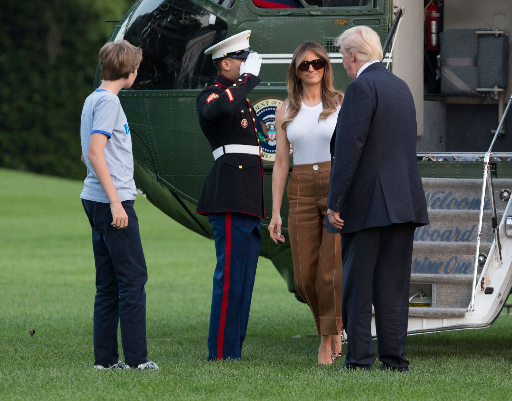 WASHINGTON, D.C. - JUNE 11: (AFP-OUT) U.S. President Donald Trump, first lady Melania Trump and their son Barron Trump arrive at the White House June 11, 2017 in Washington, DC. According to reports, Melania and Barron will soon be moving from Trump Tower in New York City to the White House. (Photo by Chris Kleponis-Pool/Getty Images)