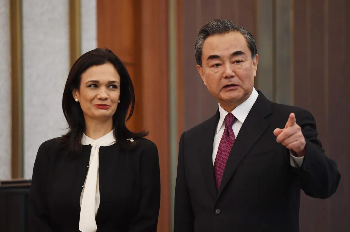 Panama's Vice President and Foreign Minister Isabel de Saint Malo (L) and Chinese Foreign Minister Wang Yi chat during a ceremony on establishing diplomatic relations on June 13, 2017 in Beijing, China (Greg Baker - Pool/Getty Images)