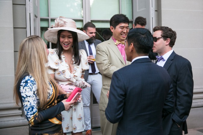 Guests mingle at the Frick's Fifth Avenue Garden. (Benjamin Chasteen/The Epoch Times)