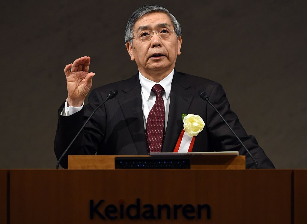 The Bank of Japan governor Haruhiko Kuroda delivers a speech during the Japan Business Federatin (Keidanren) Board of Councillors meeting at its headquarters in Tokyo on Dec. 25, 2014. (TOSHIFUMI KITAMURA/AFP/Getty Images)