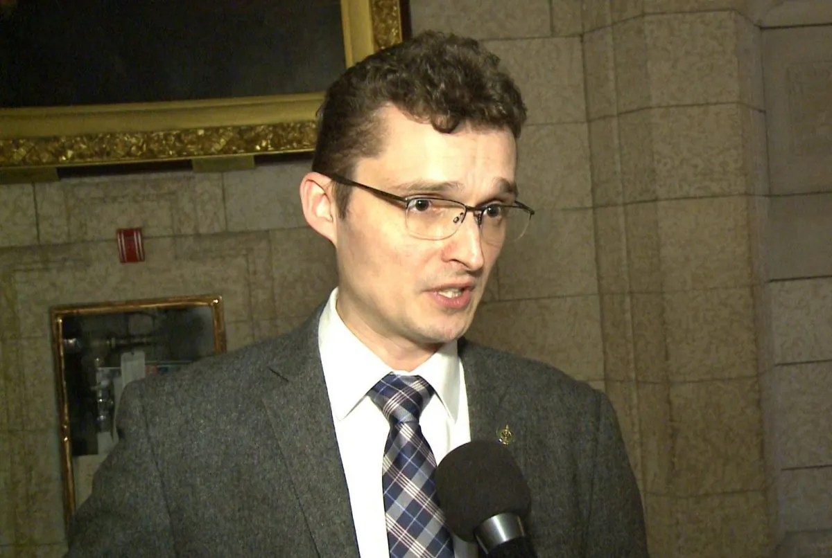 Conservative MP Tom Kmiec talks to NTD Televisions inside Parliament in Ottawa on May 2, 2017. Kmiec presented a petition in the House calling for the release of Canadian citizen Sun Qian, who was detained in Beijing in early February. (NTD Television)
