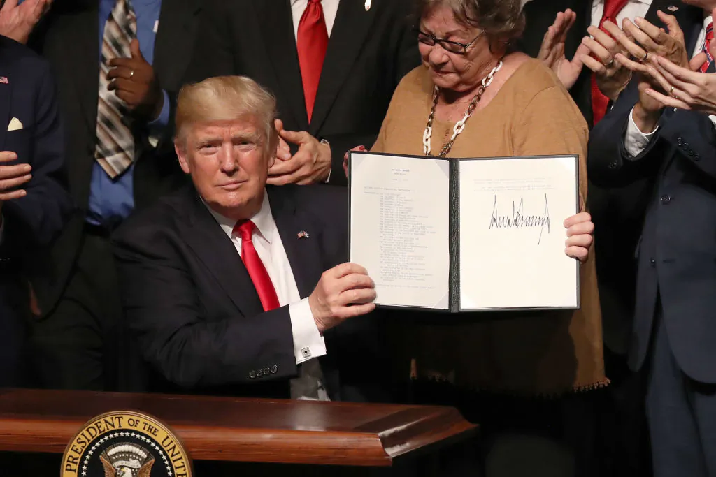 President Donald Trump shows the policy changes he is making toward Cuba at the Manuel Artime Theater in the Little Havana neighborhood in Miami, Fla., on June 16, 2017. (Joe Raedle/Getty Images)