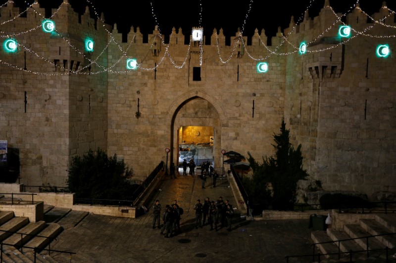 Israeli policemen secure the scene of the shooting and stabbing attack outside Damascus gate in Jerusalem's old city June 16, 2017. REUTERS/Ammar Awad