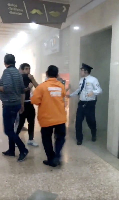 People are seen inside a shopping center after a blast took place, in Bogota, Colombia, June 17, 2017 in this still image from video obtained from social media. (Nicolas Moncada @niroel via Reuters)