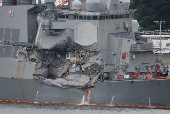 The Arleigh Burke-class guided-missile destroyer USS Fitzgerald, damaged by colliding with a Philippine-flagged merchant vessel, is seen at the U.S. naval base in Yokosuka,, Japan June 18, 2017. REUTERS/Toru Hanai