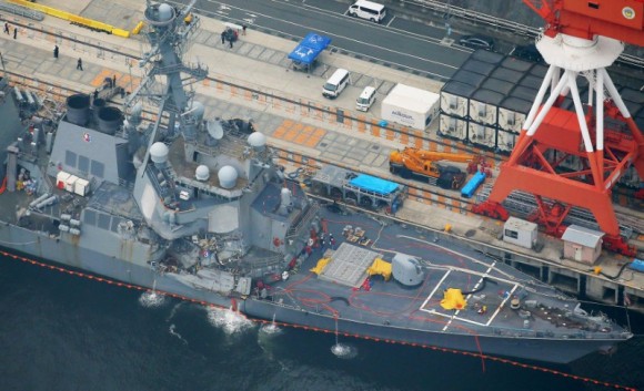 The Arleigh Burke-class guided-missile destroyer USS Fitzgerald, damaged by colliding with a Philippine-flagged merchant vessel, is seen at the U.S. naval base in Yokosuka, Japan, in this photo taken by Kyodo June 18, 2017. (Kyodo/via Reuters)