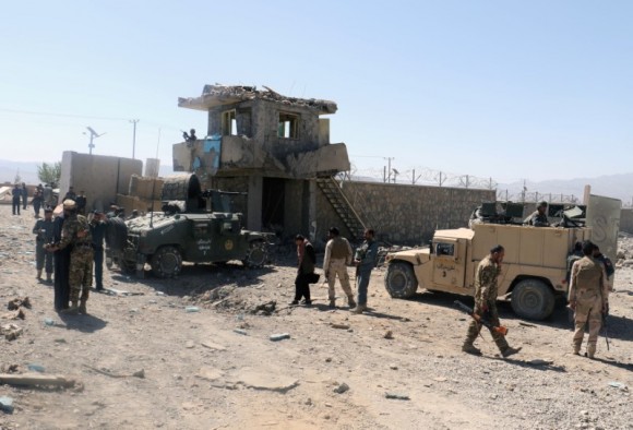 Afghan security forces inspect the aftermath of a suicide bomb blast in Paktia Province, Afghanistan June 18, 2017. (Reuters/Samiullah Peiwand)