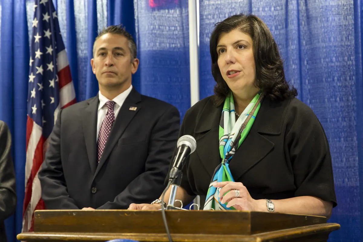 Nassau County District Attorney Madeline Singas and Assistant Special Agent in charge of Homeland Security Investigations, New York, Jason Molina (3rd L), at a press conference to announce the 85-count indictment of 41 alleged MS-13 gang members in Nassau County, Long Island, N.Y., on June 15, 2017.