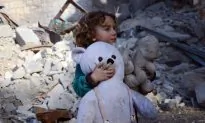 Hero Runs Into ISIS Gunfire to Rescue Little Girl (Video)