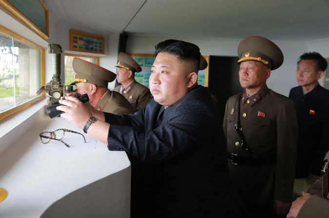 An undated picture of North Korean leader Kim Jong-Un (C) released from North Korea's official Korean Central News Agency on May 5, 2017. (STR/AFP/Getty Images)