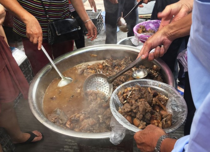 Dog meat is served at a restaurant in Yulin, in China's southern Guangxi region on June 21, 2017.(Becky Davis/AFP/Getty Images)