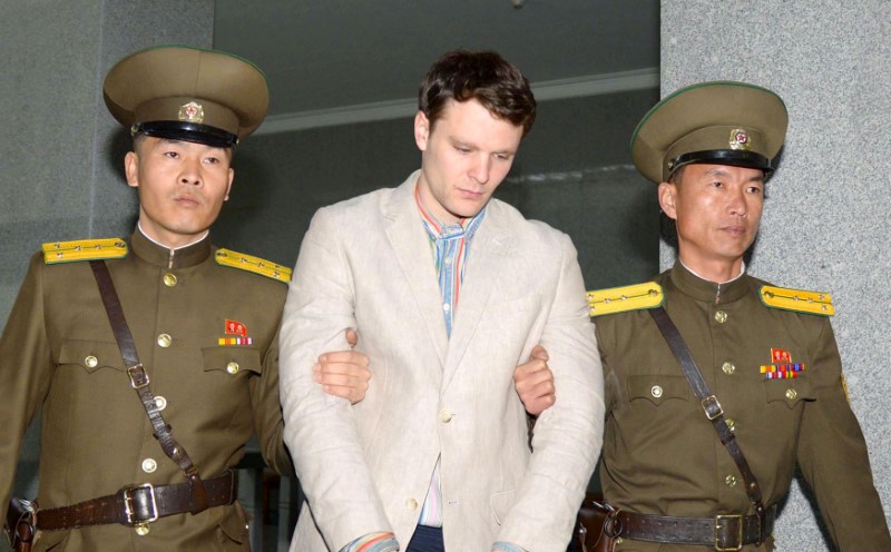 FILE PHOTO - Otto Frederick Warmbier (C), a University of Virginia student who was detained in North Korea since early January, is taken to North Korea's top court in Pyongyang, North Korea, in this photo released by Kyodo on March 16, 2016. (Mandatory credit REUTERS/Kyodo)
