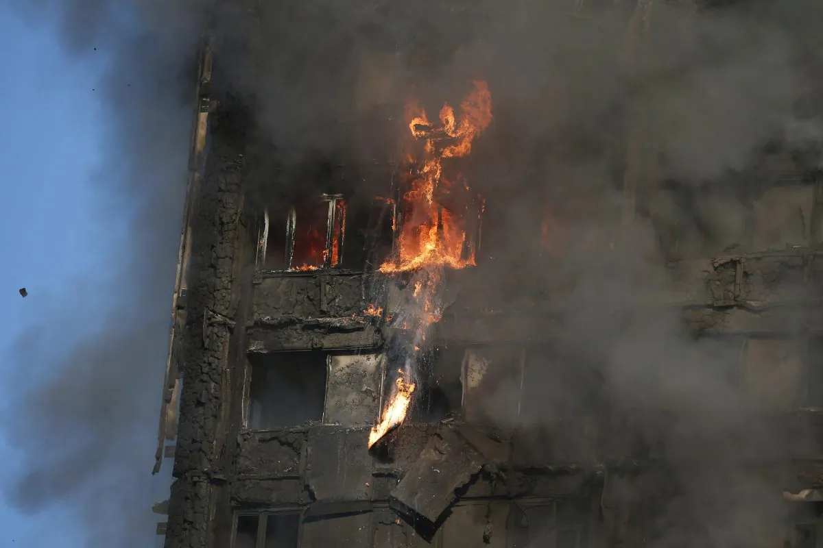 Fire rips through Grenfell Tower as firefighters attempt to control a huge blaze on June 14, 2017 in west London. (Daniel Leal-Olivas/AFP/Getty Images)