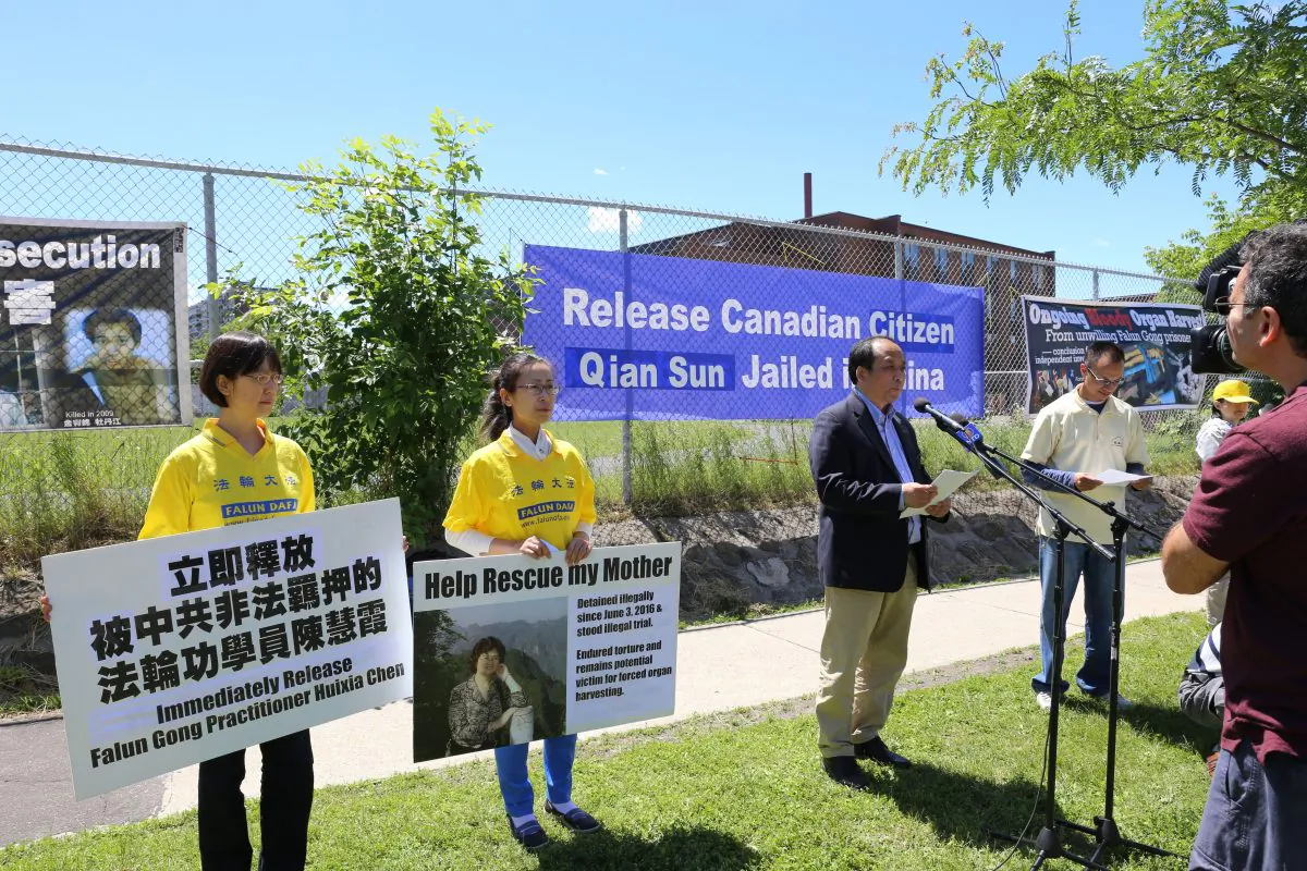 Falun Dafa Association of Canada president Li Xun speaks during a rally outside the Chinese Embassy in Ottawa on June 26, 2017, calling for the release of Canadian citizen Sun Qian who is currently detained in China for practising Falun Gong. (Donna He/The Epoch Times)