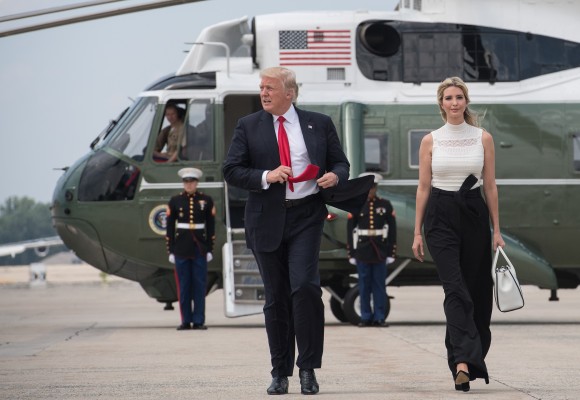 US President Donald Trump waves as he walks with his daughter Ivanka to board Air Force one at Andrews Air Force Base in Maryland on June 13, 2017 en route to Milwaukee, Wisconsin.(NICHOLAS KAMM/AFP/Getty Images)